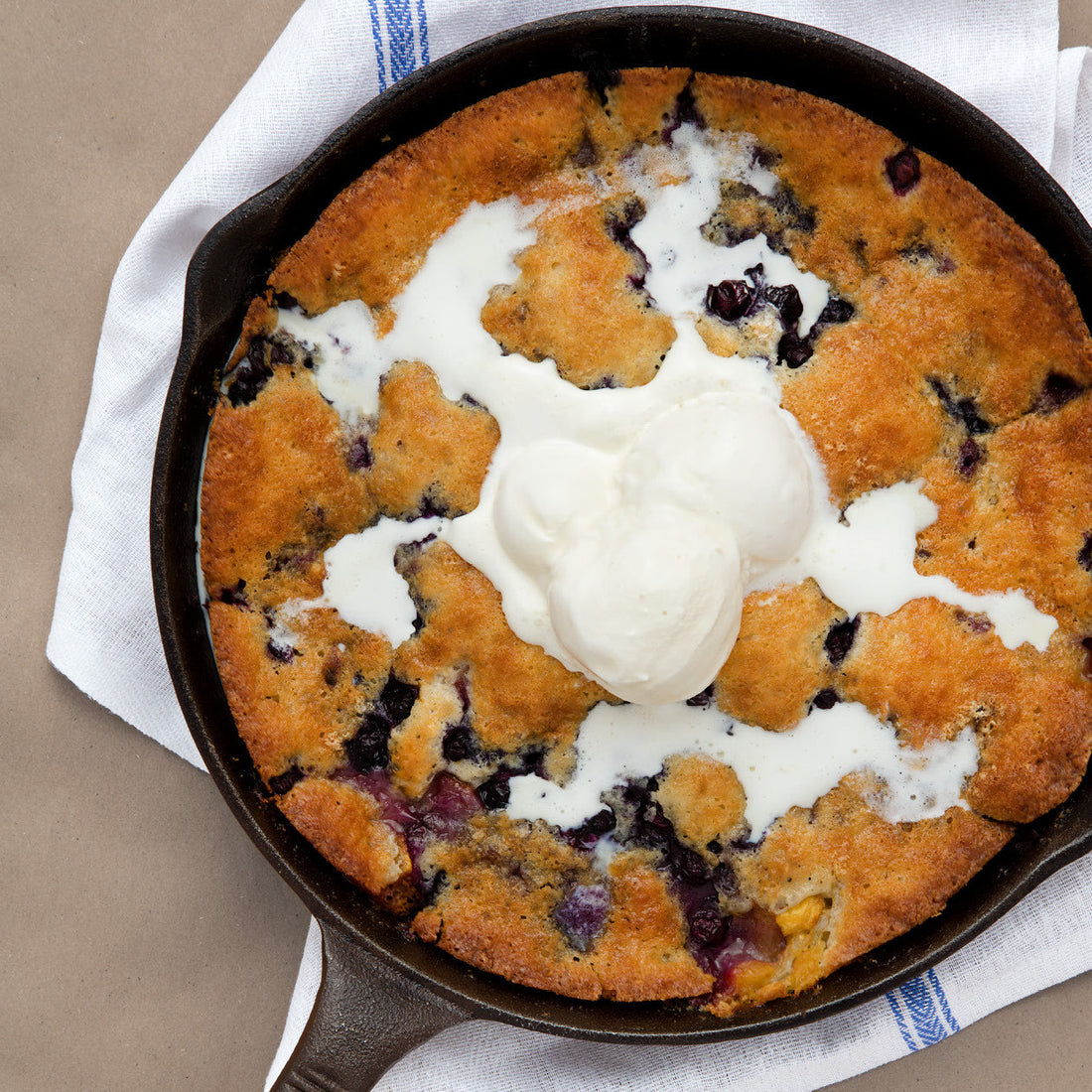 Peach And Blueberry Cobbler With Vanilla Ice Cream